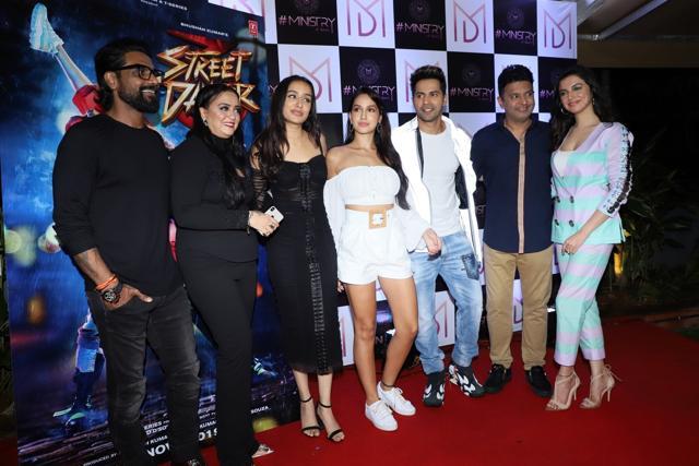 Director Remo D'Souza, his wife Lizelle D'Souza, actors Varun Dhawan, Shraddha Kapoor, Nora Fatehi, T-Series MD Bhushan Kumar and his wife Divya Khsola Kumar at the wrap-up party of Street Dancer 3D. (IANS) Director Remo D'Souza, his wife Lizelle D'Souza, actors Varun Dhawan, Shraddha Kapoor, Nora Fatehi, T-Series MD Bhushan Kumar and his wife Divya Khsola Kumar at the wrap-up party of Street Dancer 3D. (IANS)