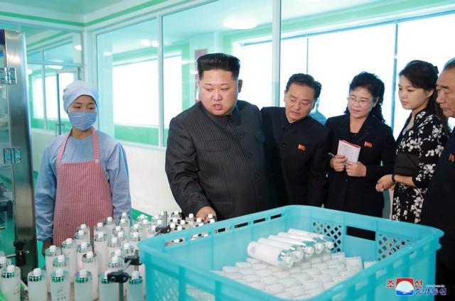 North Korean leader Kim Jong Un and wife Ri Sol Ju visit a cosmetics factory. (REUTERS) North Korean leader Kim Jong Un and wife Ri Sol Ju visit a cosmetics factory. (REUTERS)