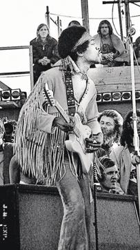 Jimi Hendrix performing his legendary two-hour performance at Woodstock. His was the last performance at Woodstock. (Alamy Stock Photo) Jimi Hendrix performing his legendary two-hour performance at Woodstock. His was the last performance at Woodstock. (Alamy Stock Photo)