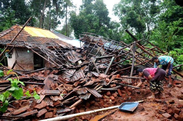 A view of a house whose wall collapsed following heavy monsoon rain in Karnataka’s Chikmagalur on Saturday. (PTI) A view of a house whose wall collapsed following heavy monsoon rain in Karnataka’s Chikmagalur on Saturday. (PTI)