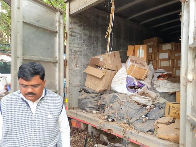 Sharad Buttepatil, member of the district planning committee of zilla parishad, Pune, at the warehouse with the truck which had the expired medicines. (HT PHOTO)