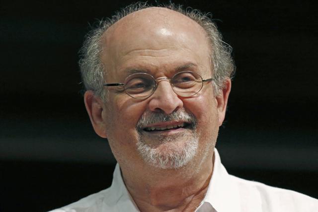 FILE - In a Saturday, Aug. 18, 2018 file photo, author aSalman Rushdie laughs as he highlights his own start as a writer during the Mississippi Book Festival in Jackson, Miss. (AP Photo/Rogelio V. Solis, File) (AP) FILE - In a Saturday, Aug. 18, 2018 file photo, author aSalman Rushdie laughs as he highlights his own start as a writer during the Mississippi Book Festival in Jackson, Miss. (AP Photo/Rogelio V. Solis, File) (AP)