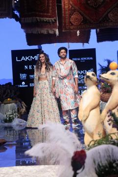 Farhan Akhtar and singer Shibani Dandekar showcase creations Payal Singhal at the Lakme Fashion Week Winter/Festive 2019 in Mumbai. (IANS) Farhan Akhtar and singer Shibani Dandekar showcase creations Payal Singhal at the Lakme Fashion Week Winter/Festive 2019 in Mumbai. (IANS)