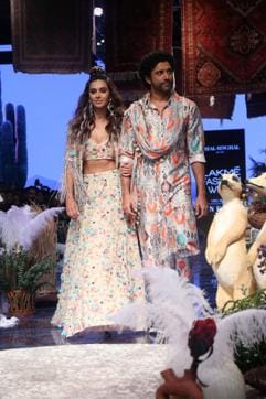 Farhan Akhtar and singer Shibani Dandekar walk the ramp at Lakme Fashion Week hand-in-hand. (IANS) Farhan Akhtar and singer Shibani Dandekar walk the ramp at Lakme Fashion Week hand-in-hand. (IANS)
