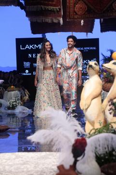 Farhan Akhtar and singer Shibani Dandekar showcase creations Payal Singhal at the Lakme Fashion Week Winter. (IANS) Farhan Akhtar and singer Shibani Dandekar showcase creations Payal Singhal at the Lakme Fashion Week Winter. (IANS)