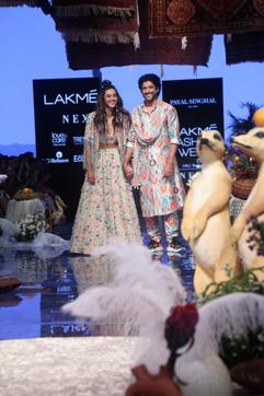 Farhan Akhtar and singer Shibani Dandekar showcase creations Payal Singhal at the Lakme Fashion Week. (IANS) Farhan Akhtar and singer Shibani Dandekar showcase creations Payal Singhal at the Lakme Fashion Week. (IANS)