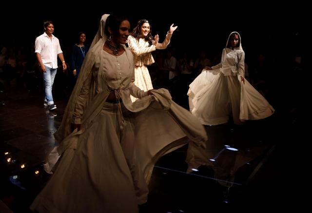 Mrunal Thakur and other models perform during the Lakme Fashion Week in Mumbai on Thursday. (ANI) Mrunal Thakur and other models perform during the Lakme Fashion Week in Mumbai on Thursday. (ANI)