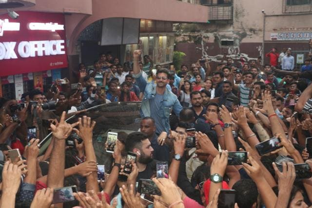 Hrithik Roshan waves at fans outside a Mumbai cinema hall on July 13. (IANS) Hrithik Roshan waves at fans outside a Mumbai cinema hall on July 13. (IANS)