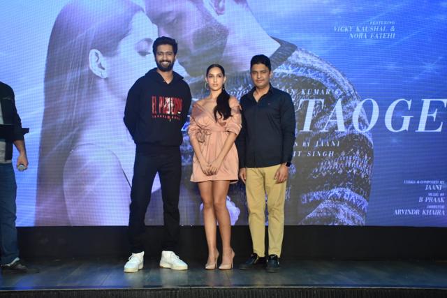 Vicky Kaushal, Nora Fatehi and Bhushan Kumar at the Pachtaoge party. (Varinder Chawla) Vicky Kaushal, Nora Fatehi and Bhushan Kumar at the Pachtaoge party. (Varinder Chawla)