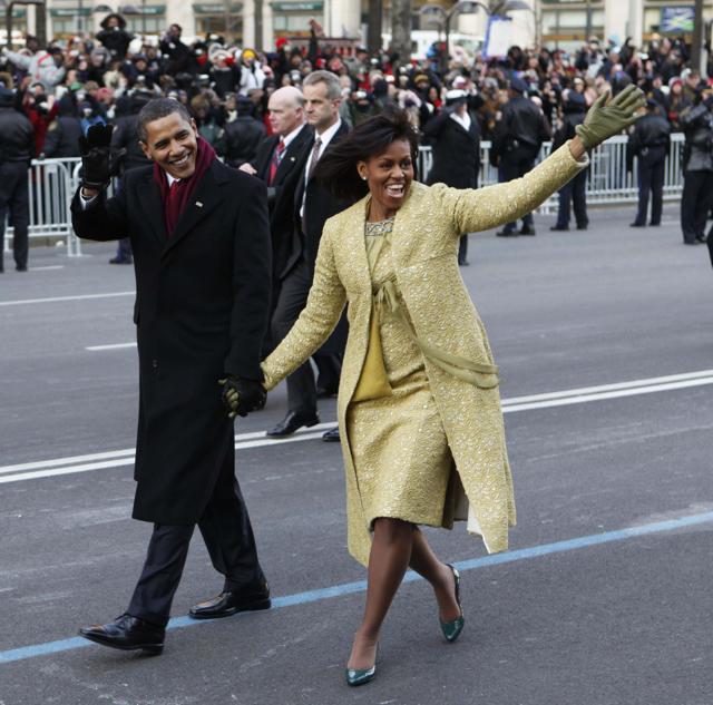 FILE - This Jan. 20, 2009 file photo shows President Barack Obama and first lady Michelle Obama, wearing Isabel Toledo as they walk the inaugural parade route in Washington. (AP Photo/Charles Dharapak, file) FILE - This Jan. 20, 2009 file photo shows President Barack Obama and first lady Michelle Obama, wearing Isabel Toledo as they walk the inaugural parade route in Washington. (AP Photo/Charles Dharapak, file)