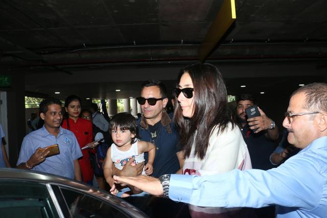 Saif Ali Khan, Kareena Kapoor and their son Taimur Ali Khan seen at Chhatrapati Shivaji International Airport in Mumbai on Aug 21, 2019. (IANS) (IANS) Saif Ali Khan, Kareena Kapoor and their son Taimur Ali Khan seen at Chhatrapati Shivaji International Airport in Mumbai on Aug 21, 2019. (IANS) (IANS)
