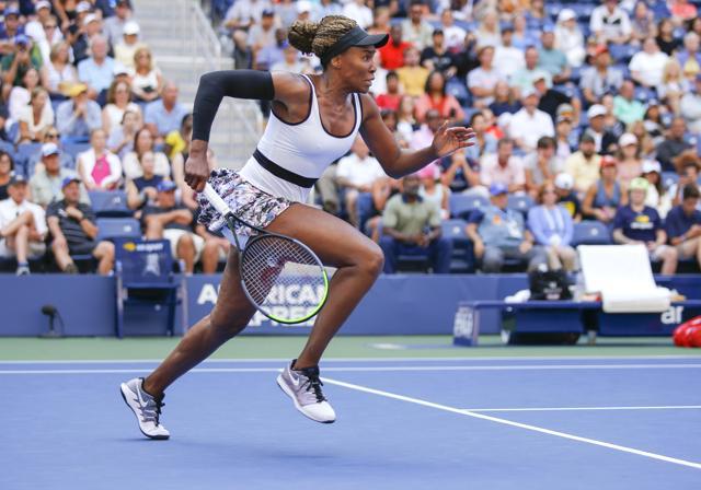 Venus Williams, of the United States, chases down a shot from Zheng Saisai, of China. (AP)