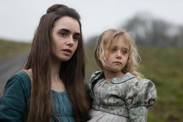 Lily Collins as Fantine, in a still from Les Miserables.