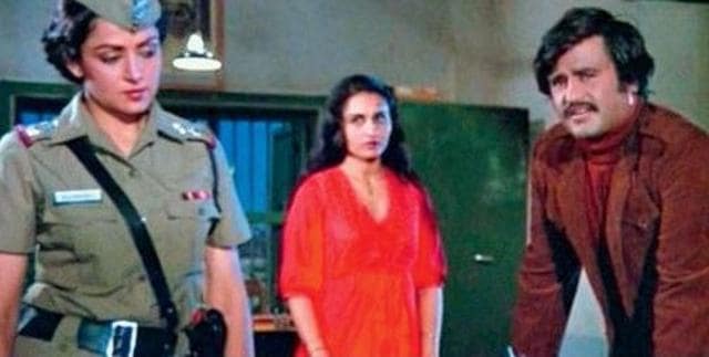 Rajinikanth with Hema Malini in Andha Kanoon. Rajinikanth with Hema Malini in Andha Kanoon.