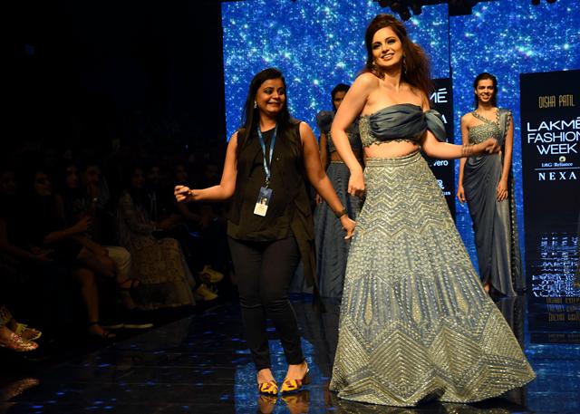 Kangana Ranaut showcases the collection of designer Disha Patil at Lakme Fashion Week 2019. Kangana Ranaut showcases the collection of designer Disha Patil at Lakme Fashion Week 2019.