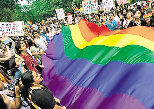 Gay rights activists display a rainbow flag during an earlier Queer Pride March in Delhi. (REUTERS) Gay rights activists display a rainbow flag during an earlier Queer Pride March in Delhi. (REUTERS)