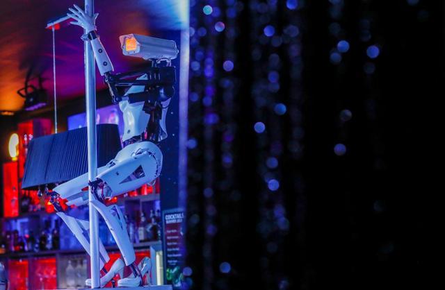 Designed by British artist Giles Walker, the robots have their metal bodies overlaid with parts from plastic mannequins. (Reuters) Designed by British artist Giles Walker, the robots have their metal bodies overlaid with parts from plastic mannequins. (Reuters)