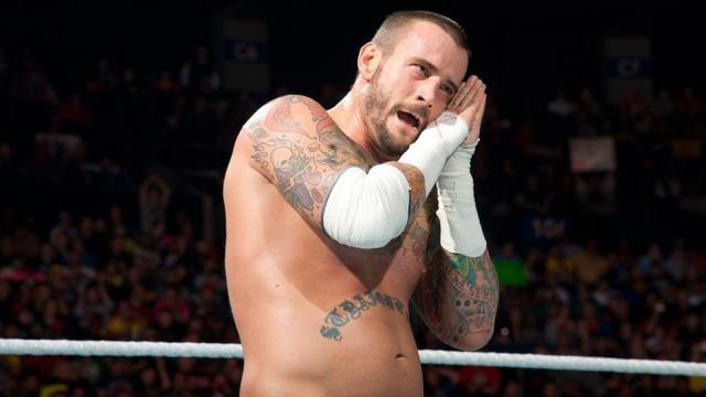 CM Punk is a former 2-time WWE and 3-time World Heavyweight champion. (WWE) CM Punk is a former 2-time WWE and 3-time World Heavyweight champion. (WWE)