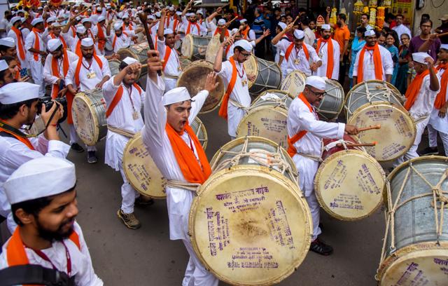 A Dhol tasha pathak playing during the first day of Ganesh festival. (Sanket Wankhade / Hindustan Times) A Dhol tasha pathak playing during the first day of Ganesh festival. (Sanket Wankhade / Hindustan Times)