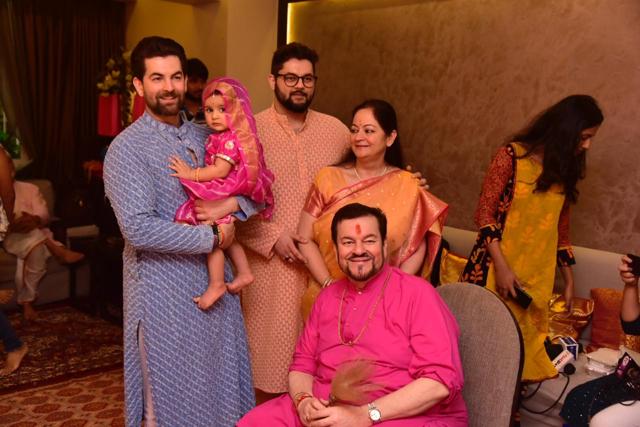 Neil Nitin Mukesh holds his 11-month-old daughter Nurvi as he celebrates Ganesh Chaturthi. (Varinder Chawla) Neil Nitin Mukesh holds his 11-month-old daughter Nurvi as he celebrates Ganesh Chaturthi. (Varinder Chawla)