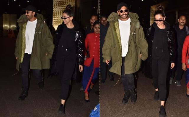 Ranveer Singh and Deepika Padukone walk hand in hand at the Mumbai airport. (Varinder Chawla)
