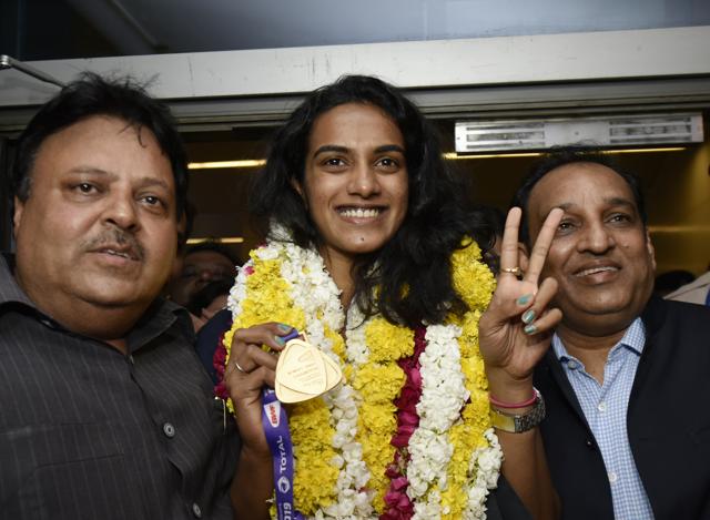 PV Sindhu arrives at the Indira Gandhi International Airport after winning the BWF Badminton World Championship at Switzerland’s Basel, in New Delhi, India, on Tuesday, August 27, 2019. (Photo by Vipin Kumar / Hindustan Times) PV Sindhu arrives at the Indira Gandhi International Airport after winning the BWF Badminton World Championship at Switzerland’s Basel, in New Delhi, India, on Tuesday, August 27, 2019. (Photo by Vipin Kumar / Hindustan Times)