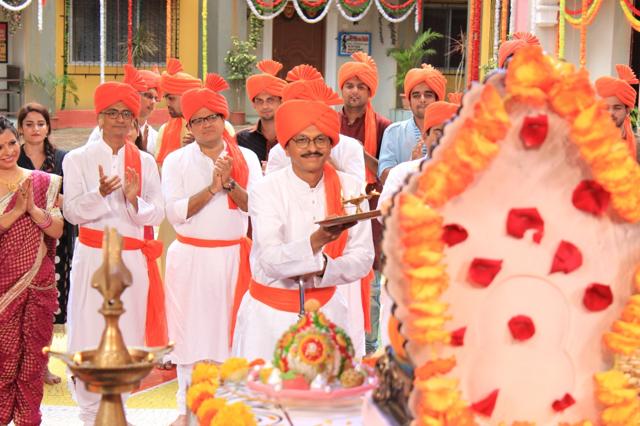 Residents of the Gokuldham Society welcome Lord Ganpati.