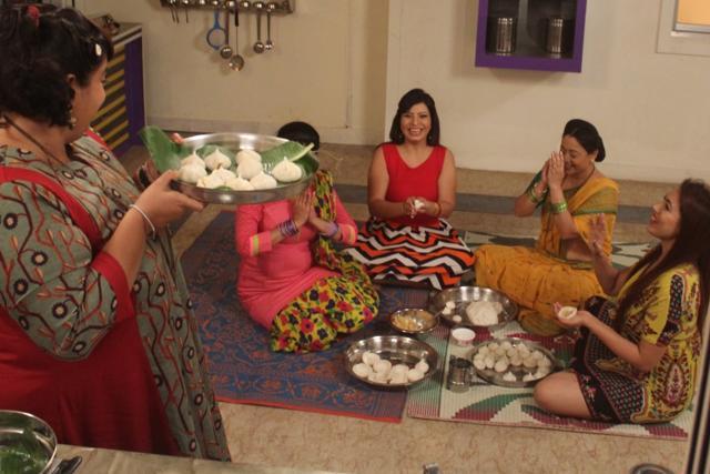 Residents of the Gokuldham Society prepare modaks for the Ganpati celebrations.