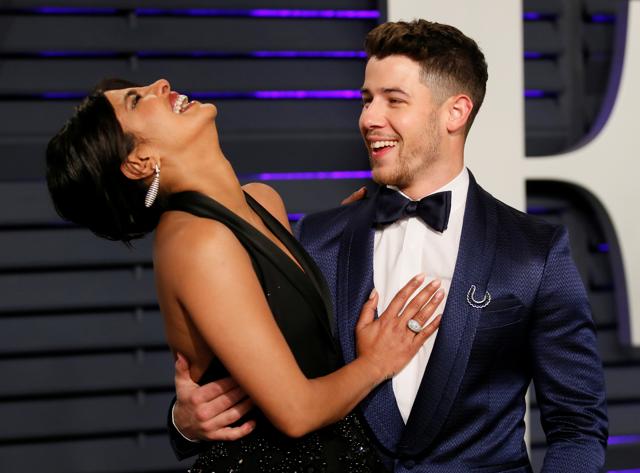 Priyanka Chopra and Nick Jonas at the Vanity Fair Oscars afterparty. (REUTERS) Priyanka Chopra and Nick Jonas at the Vanity Fair Oscars afterparty. (REUTERS)