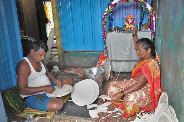 Subhash Kadam and Kanchan Subhash busy at work, creating dhol skins from animal hide in Sangli. (UDAY DEOLEKAR)