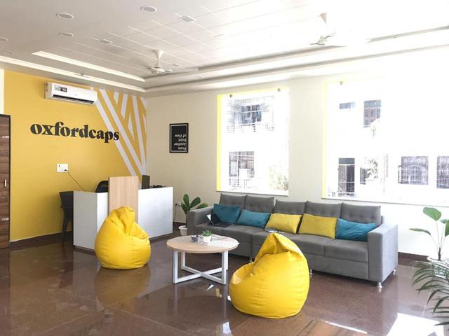 At Oxfordcap’s waiting room, students can enjoy a cup of coffee on the plush sofas At Oxfordcap’s waiting room, students can enjoy a cup of coffee on the plush sofas