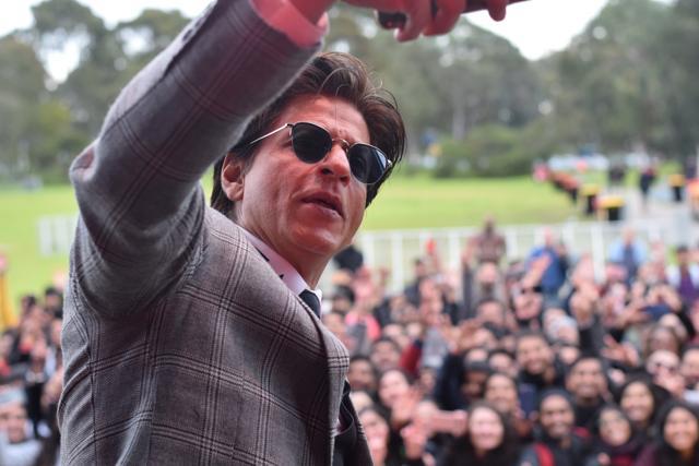 Actor Shah Rukh Khan poses for selfies with the students at La Trobe University where he received an honorary doctorate degree from for his contributions and efforts towards underprivileged children and women's empowerment through Meer Foundation besides his achievements in the Indian entertainment industry, in Melbourne, Australia on Aug 9, 2019. The university also announced a scholarship in the name of the superstar for aspiring female researchers from India. (IANS) Actor Shah Rukh Khan poses for selfies with the students at La Trobe University where he received an honorary doctorate degree from for his contributions and efforts towards underprivileged children and women's empowerment through Meer Foundation besides his achievements in the Indian entertainment industry, in Melbourne, Australia on Aug 9, 2019. The university also announced a scholarship in the name of the superstar for aspiring female researchers from India. (IANS)