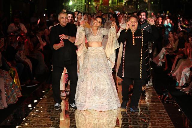 Deepika Paukone with Abu Jani and Sandeep Khosla. Deepika Paukone with Abu Jani and Sandeep Khosla.