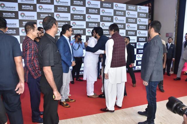 Abhishek Bachchan hugging Suresh Oberoi. Abhishek Bachchan hugging Suresh Oberoi.