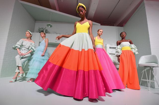 Models pose during the alice + olivia by Stacey Bendet Spring 2020 Fashion Presentation at Root Studio during New York Fashion Week: The Shows on September 9, 2019 in New York City. (Photo by Angela Weiss / AFP) (AFP)