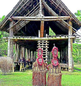 One of the largest haus tamburan or secret men’s houses in Kanganamun village. (Geetika Jain) One of the largest haus tamburan or secret men’s houses in Kanganamun village. (Geetika Jain)