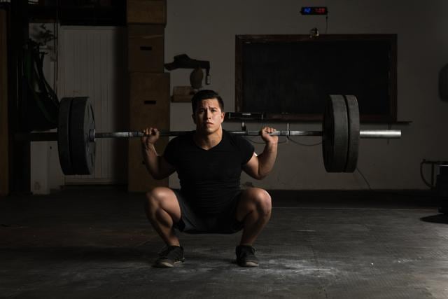 A barbell squat is the king of all exercises because the entire body gets worked out by the exercise (Shutterstock) A barbell squat is the king of all exercises because the entire body gets worked out by the exercise (Shutterstock)