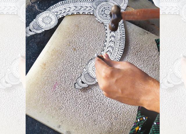 A leather collar being designed at the workshop A leather collar being designed at the workshop