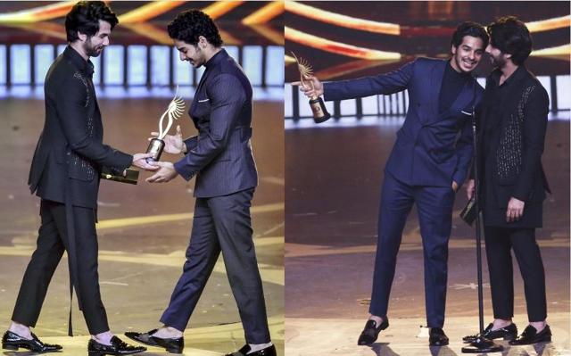 Shahid Kapoor presents the Best Debut Award (Male) award to Ishaan Khatter at the 20th IIFA awards ceremony. (PTI/AP)