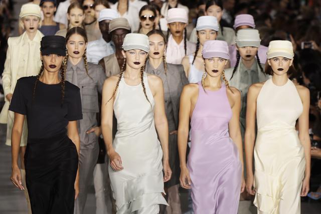 Models Joan Smalls, from front left, Gigi Hadid, Bella Hadid and Kaia Gerber wear creations with other models as part of the Max Mara Spring-Summer 2020 collection, unveiled during the fashion week, in Milan, Italy, Thursday, Sept. 19, 2019. (AP Photo/Luca Bruno) (AP) Models Joan Smalls, from front left, Gigi Hadid, Bella Hadid and Kaia Gerber wear creations with other models as part of the Max Mara Spring-Summer 2020 collection, unveiled during the fashion week, in Milan, Italy, Thursday, Sept. 19, 2019. (AP Photo/Luca Bruno) (AP)