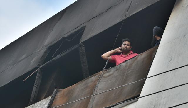 The fire broke out on the ground floor where the godown was located and then spread to the first and the second floor. (Gurpreet Singh/HT)
