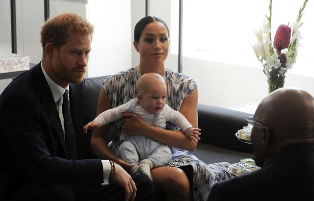 Britain's Prince Harry and Meghan, Duchess of Sussex, holding their son Archie, meet with Anglican Archbishop Emeritus, Desmond Tutu in Cape Town. (AP) Britain's Prince Harry and Meghan, Duchess of Sussex, holding their son Archie, meet with Anglican Archbishop Emeritus, Desmond Tutu in Cape Town. (AP)