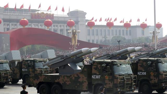Military vehicles roll down as members of a Chinese military honour guard march during the celebration to commemorate the 70th anniversary of the founding of Communist China in Beijing, Tuesday, Oct. 1, 2019. (AP) Military vehicles roll down as members of a Chinese military honour guard march during the celebration to commemorate the 70th anniversary of the founding of Communist China in Beijing, Tuesday, Oct. 1, 2019. (AP)