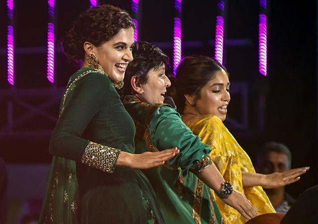Bhumi Pednekar (R), Taapsee Pannu (L) and singer Falguni Pathak perform during Navratri celebrations. (PTI) Bhumi Pednekar (R), Taapsee Pannu (L) and singer Falguni Pathak perform during Navratri celebrations. (PTI)
