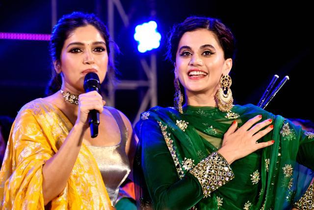 Bhumi Pednekar and Taapsee Pannu perform during Navratri celebrations, in Mumbai. (PTI) Bhumi Pednekar and Taapsee Pannu perform during Navratri celebrations, in Mumbai. (PTI)