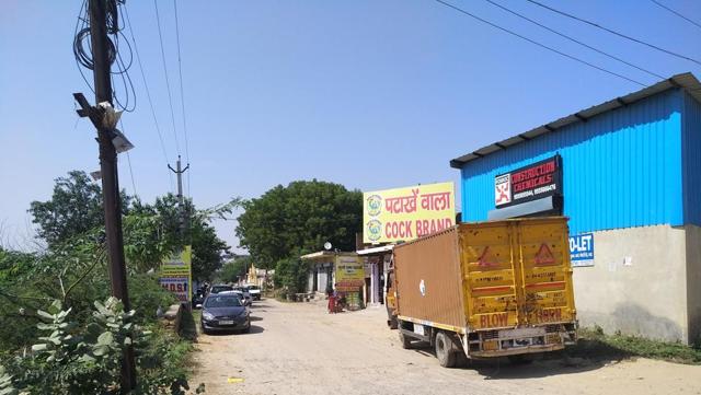 The shop selling firecrackers at Gadoli village, near Gurugram. (HT Photo ) The shop selling firecrackers at Gadoli village, near Gurugram. (HT Photo )