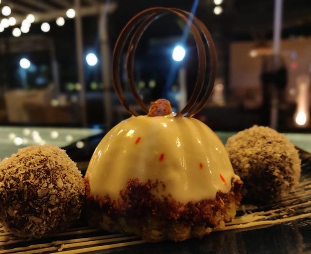 Rabdi Mousse Cake with Hazelnut Ladoo by Cinco Rabdi Mousse Cake with Hazelnut Ladoo by Cinco