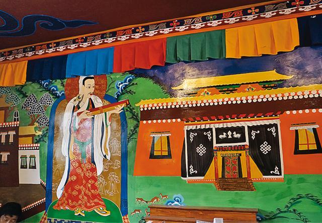 Bright murals on the wall of an incense stick-making factory in Nyemo county near Lhasa are a visual treat (Rezaul H Laskar) Bright murals on the wall of an incense stick-making factory in Nyemo county near Lhasa are a visual treat (Rezaul H Laskar)