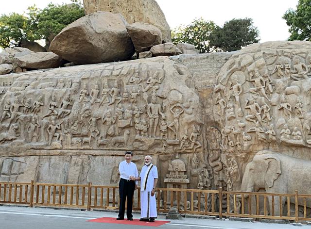 Prime Minister Narendra Modi shakes hand with Chinese President Xi Jinping at the famous site of Pallava Era during the 2nd informal summit in Mahabalipuram on Friday. (Photo: ANI) Prime Minister Narendra Modi shakes hand with Chinese President Xi Jinping at the famous site of Pallava Era during the 2nd informal summit in Mahabalipuram on Friday. (Photo: ANI)