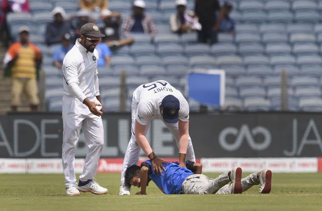 A fan gatecrashes to meet Indian team player Rohit Sharma. (PTI) A fan gatecrashes to meet Indian team player Rohit Sharma. (PTI)